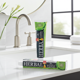 Herbal Essential Toothpaste tube for cleaning teeth, maintaining oral care, and everyday breath freshness.