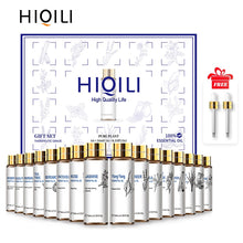 HIQILI essential oil gift box printed with botanical line art, 16 x 10ml, shown with the amber bottles and the two included glass droppers.