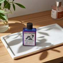 Hold Your Man Wish Oil spiritual oil bottle for keeping a partner close, love intention setting, and ritual practice.
