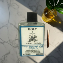 Holy Wish Oil bottle for spiritual ritual use, intention setting, and prayer work.
