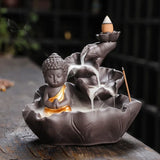 Zen Buddha backflow incense burner decor piece for calming home decoration, incense burning, and peaceful meditation use.