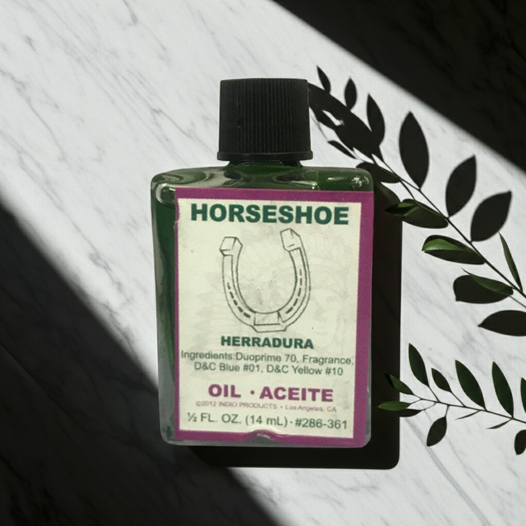 Horseshoe Wish Oil manifestation oil bottle for wish work, candle dressing, and intention setting.