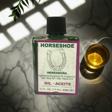Horseshoe Wish Oil ritual anointing oil bottle for prayer work, luck rituals, and spiritual application.