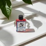 Hug Me Tight Wish Oil ritual oil bottle for love drawing, emotional closeness, and romantic intention setting.