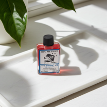 Hug Me Tight Wish Oil ritual oil bottle for love drawing, emotional closeness, and romantic intention setting.