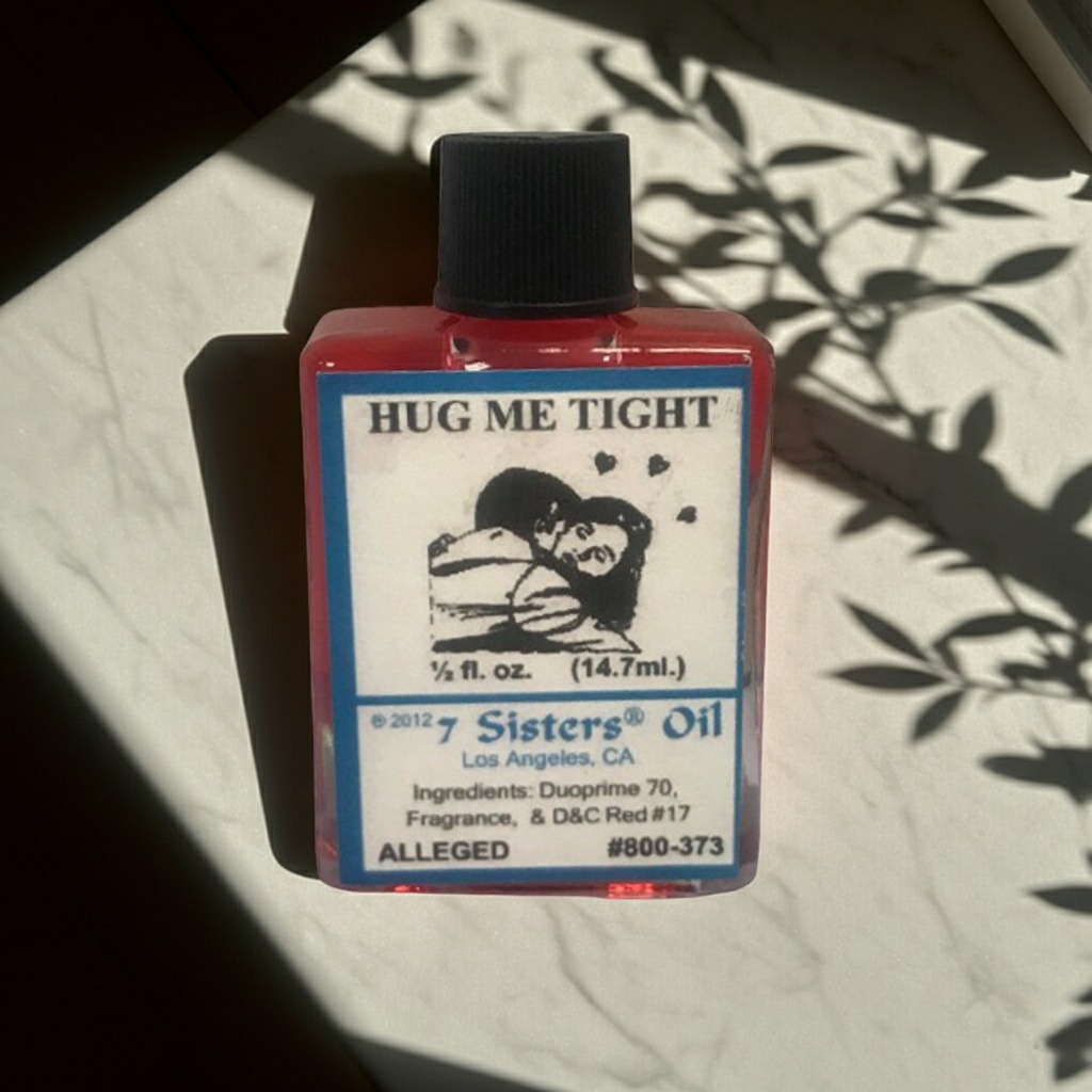 Hug Me Tight Wish Oil fragrance oil bottle for romance work, affection, and spiritual relationship support.