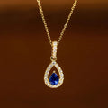 Huitan gold waterdrop pendant necklace with blue zirconia stone for elegant daily wear, evening styling, and gift giving.