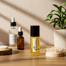 Hypnotic Poison fragrance body oil for almond and vanilla scent wear, daily use, and skin conditioning.