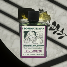I Dominate Man Wish Oil ritual oil bottle for spiritual practice, love influence work, and ceremonial use.