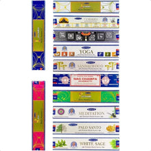 Collection of incense sticks in various packaging on a white background