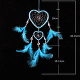 Indian style pink and purple dreamcatcher decor piece for wall display, bedroom accents, and boho interior decorating.