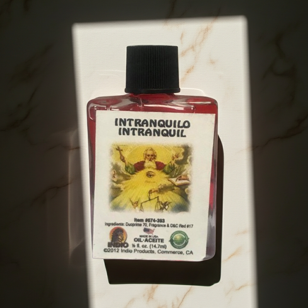 Intranquilo Intranquil Wish Oil glass bottle for candle dressing, spiritual work, and peaceful intention setting.