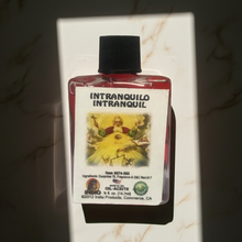 Intranquilo Intranquil Wish Oil glass bottle for candle dressing, spiritual work, and peaceful intention setting.