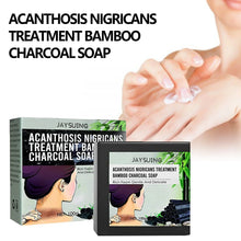Jaysuing Bamboo Charcoal Whitening Soap packaging with close-up of hands on white background.