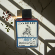 Jinx Killer Wish Oil ritual oil bottle for spiritual cleansing, intention setting, and wish fulfillment practice.
