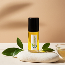 Juicy Couture Body Oil bottle — playful berry, mandarin, honeysuckle, and vanilla fragrance oil for women.