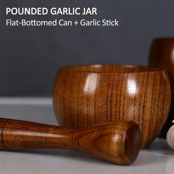 Jujube wood mortar and pestle set for grinding herbs, spices, and seasonings in everyday kitchen use.
