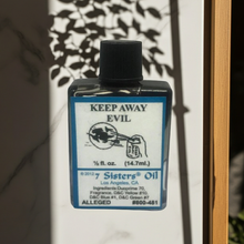 Keep Away Evil Wish Oil anointing oil bottle for prayer, ritual dressing, and spiritual shielding.