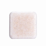 Kojic Acid & Sweet Orange Brightening Scrub Soap beige speckled bar tile on white background.