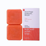 Kojic Acid & Sweet Orange Brightening Scrub Soap red bars with box packaging on white background.