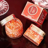 KUGE Dragon Blood Retinol Deep Moisture Face Cream jars and red box on dark surface.