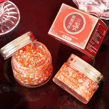 KUGE Dragon Blood Retinol Deep Moisture Face Cream jars and red box on dark surface.