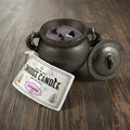Lavender smudge candle in cast iron cauldron