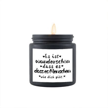 Lavender scented candle jar for aromatherapy, home fragrance, and peaceful indoor use.