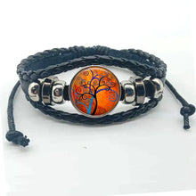 Layered boho Tree of Life charm bracelet with leather bands for trend-forward fashion and everyday wrist wear.