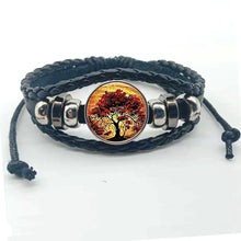 Layered leather Tree of Life charm cuff bracelet for casual outfit accessorizing and daily fashion wear.
