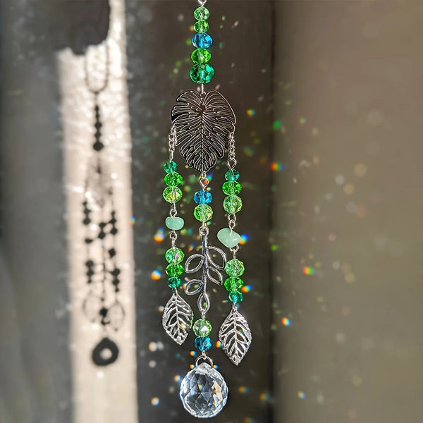 Leaf Shape Sun Catcher Tree of Life hanging ornament for window decor, light reflection, and spiritual home display.