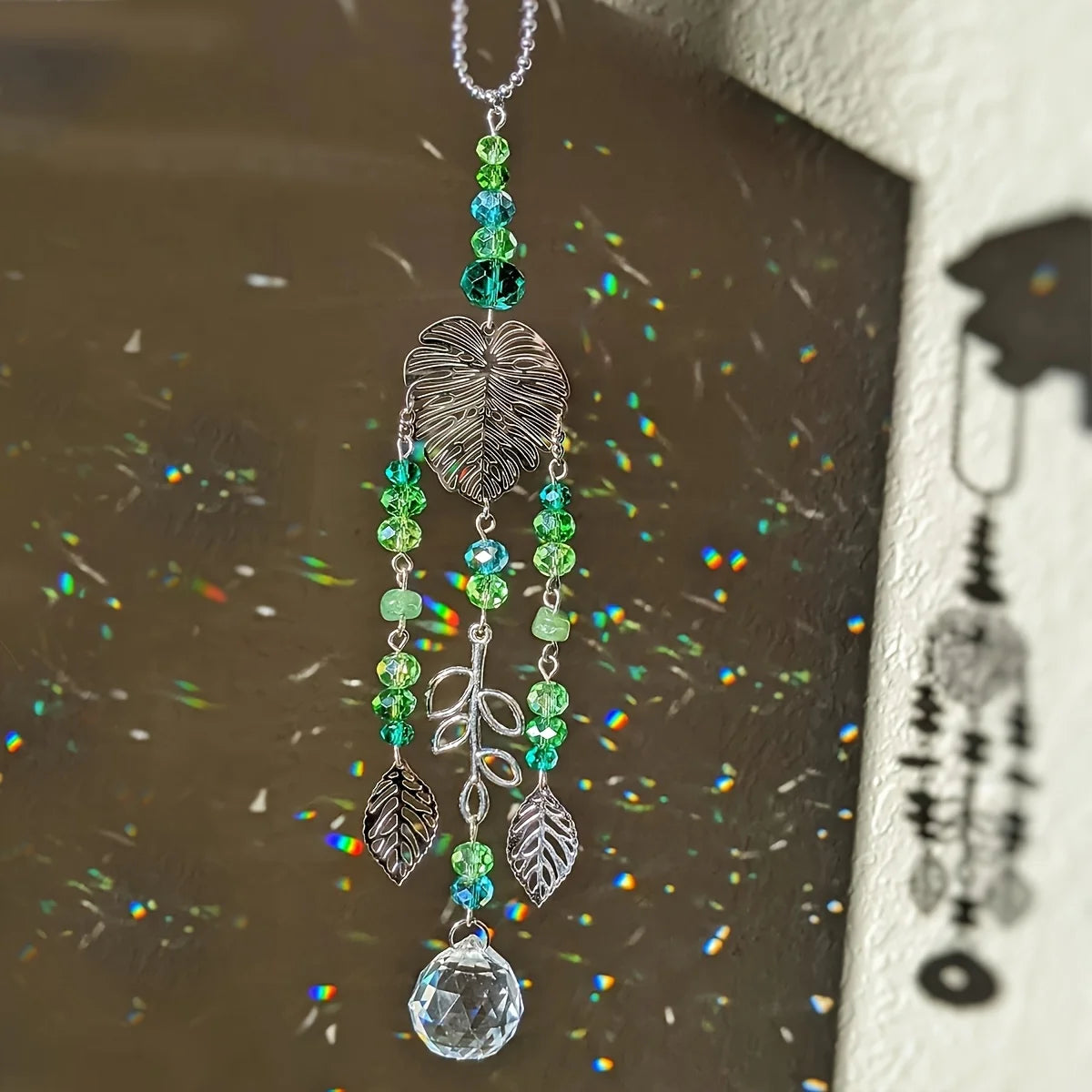 Leaf Shape Sun Catcher Tree of Life window hanging ornament for sunlight reflection, meditation space decor, and everyday home styling.