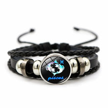 Leather bracelet with 12 constellation charms for astrology lovers, symbolic accessory use, and personalized fashion styling.