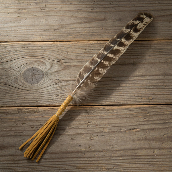 Leather wrapped smudging feather