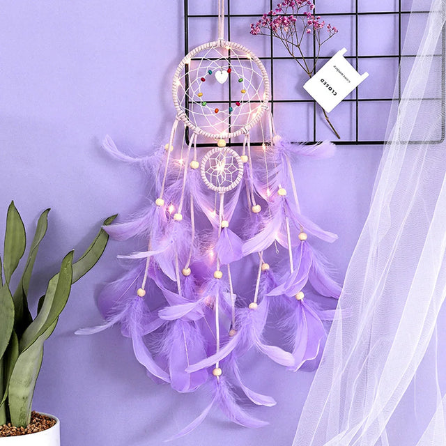 LED Dreamcatcher Pendant with Feathers hanging decor light for bedroom ambiance, festival decoration, and boho room styling.