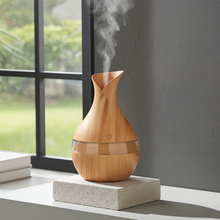 Mini Atomization Humidifier with changing LED lights for moisturizing dry air, creating ambiance, and room comfort.