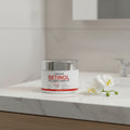 LGRAMER Retinol Lifting & Firming Face Cream jar with red and silver design on white background.