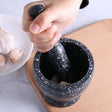 Lightweight PP resin mortar and pestle set for grinding herbs, spices, and kitchen ingredients.