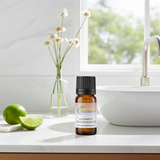 Lime essential oil bottle for aromatherapy, diffuser blends, and uplifting home fragrance use.