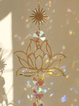 Golden Lotus Crystal Suncatcher light-catching hanging decor for creating rainbow reflections and brightening indoor spaces.