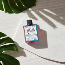 Love Breaker Wish Oil bottle ritual oil for breakup spellwork, energy work, and spiritual practice.