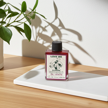 Love Me Wish Oil anointing oil bottle for love drawing, romantic rituals, and personal manifestation.