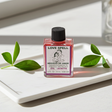 Love Spell Wish Oil bottle for attraction rituals, intention setting, and spiritual use.