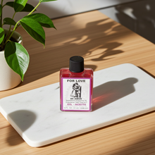 Love Wish Oil bottle of spiritual anointing oil for love intention setting, attraction rituals, and prayer use.