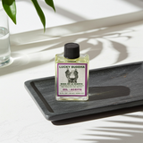 Lucky Buddha Wish Oil bottle for prayer, wish manifestation, and spiritual ritual use.