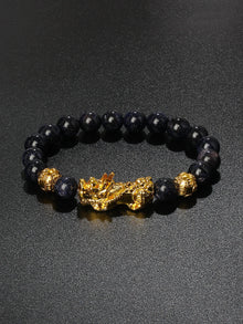 Lucky Pi Xiu Black Obsidian bracelet for prosperity intention, spiritual protection, and routine wear.