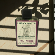 Lucky Slots Wish Oil bottle for ritual anointing, luck attraction, and manifestation work.