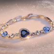 Luxury Blue Crystal Heart Charm Bracelet chain bracelet for fashion styling, gift giving, and special occasion wear.