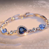 Luxury Blue Crystal Heart Charm Bracelet chain bracelet for fashion styling, gift giving, and special occasion wear.