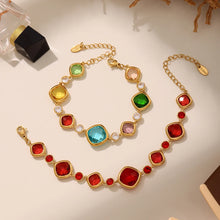 Luxury glass charm link bracelet for women with square glass pieces for formal outfits, celebrations, and statement accessorizing.